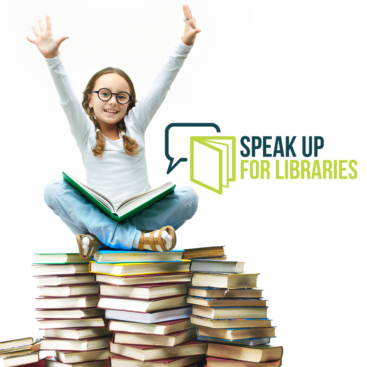 young girl with arms raised sitting on a big pile of books